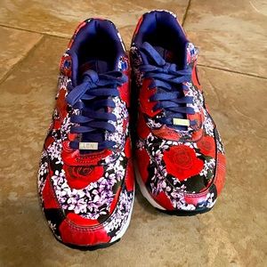 Nike purple and red floral sneakers